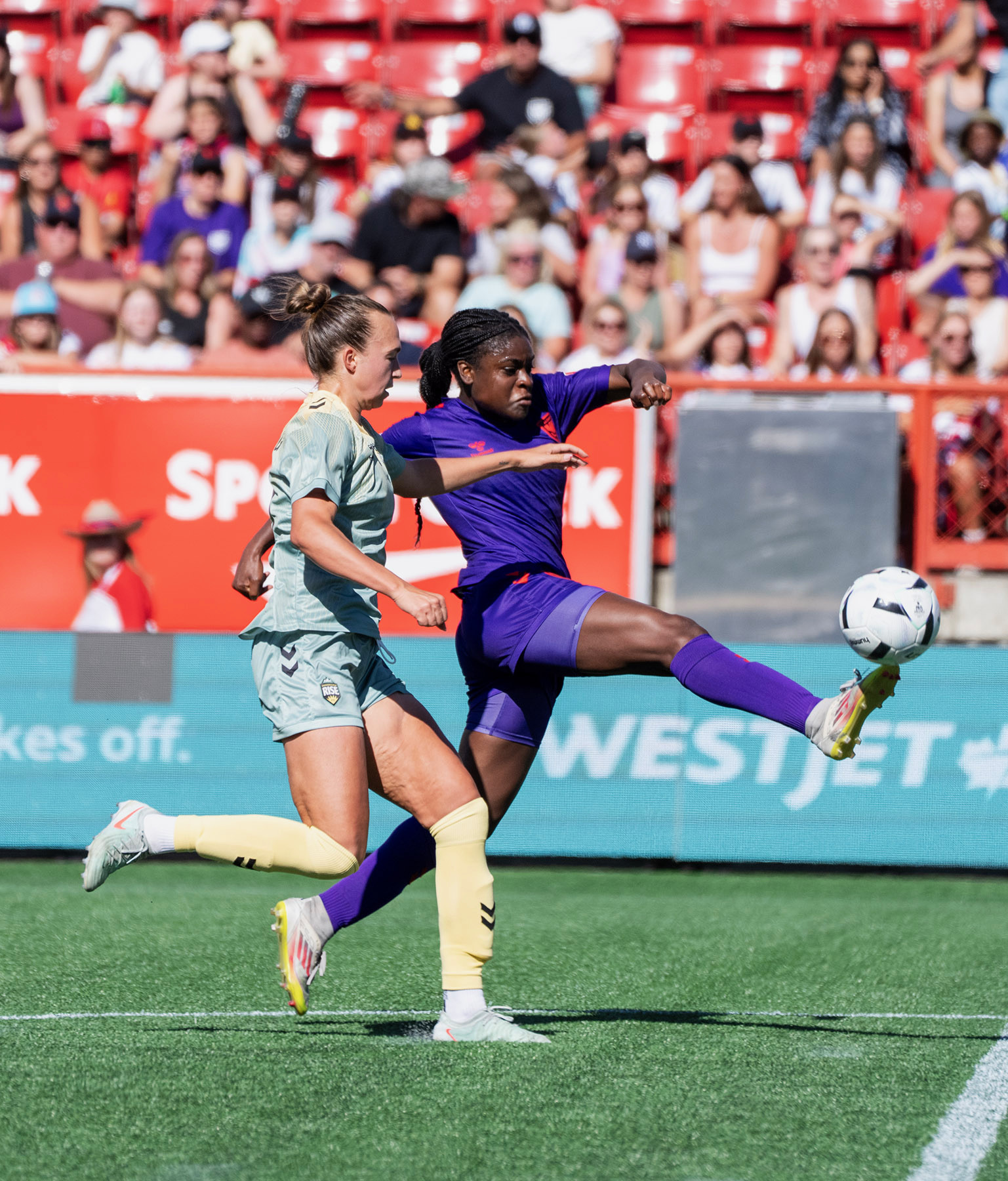 Serita Thurton scoring a goal during a match