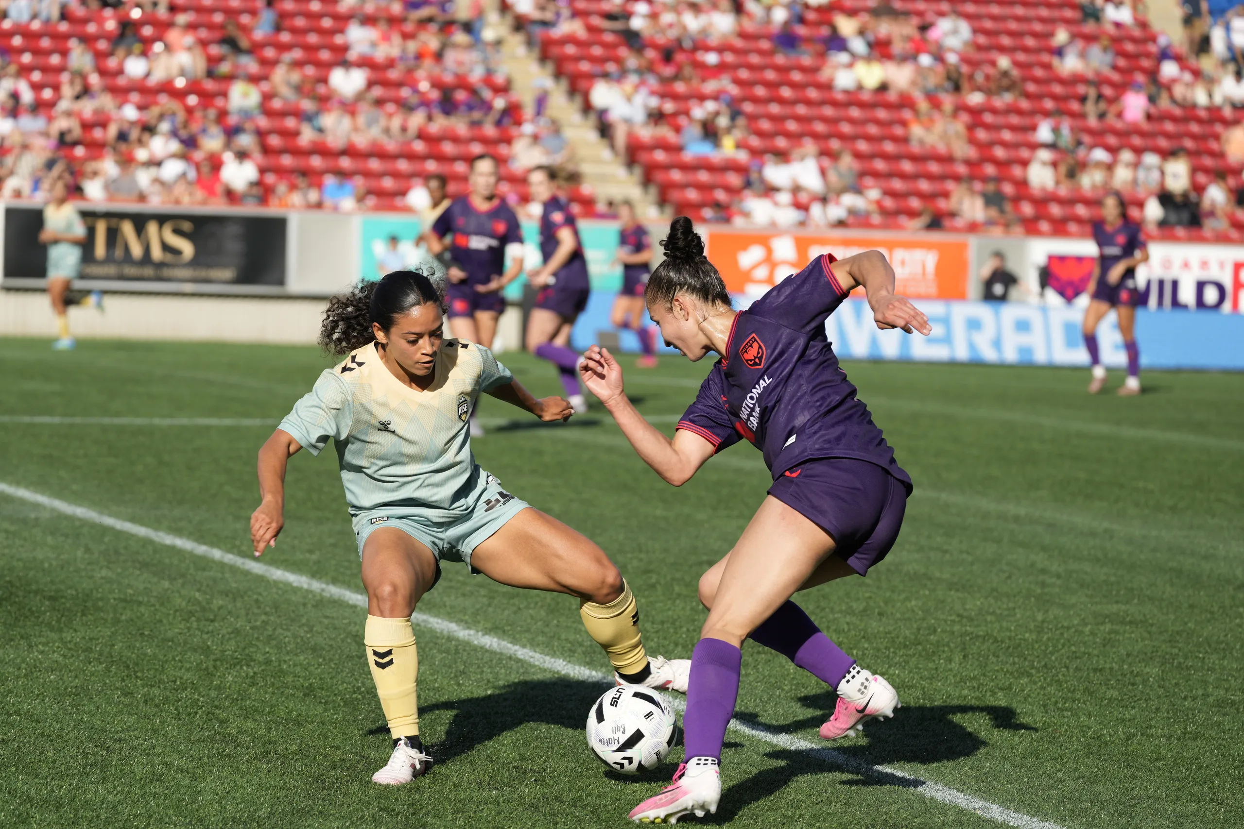 Mya Jones controls the ball against Vancouver Rise FC at McMahon Stadium